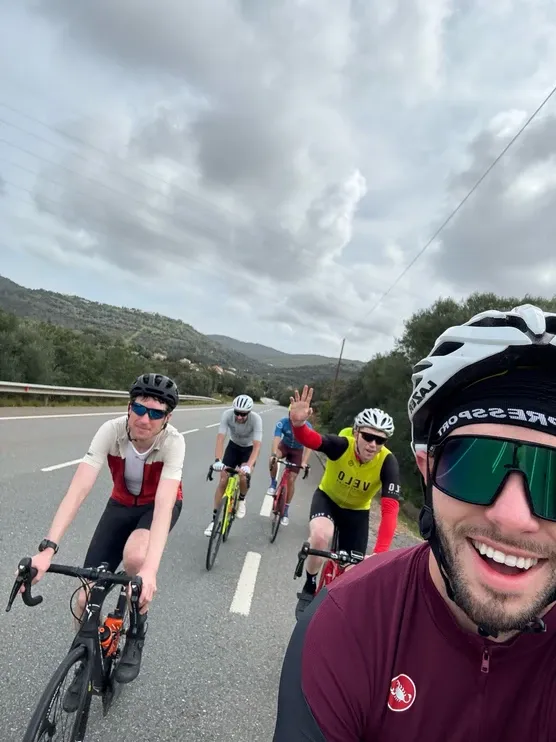 Cyclists riding together on the road