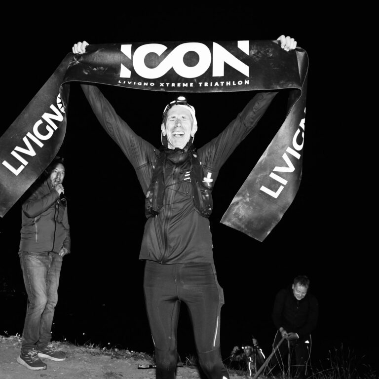 Thomas Maag celebrating at the finish of ICON Extreme Triathlon in Livigno
